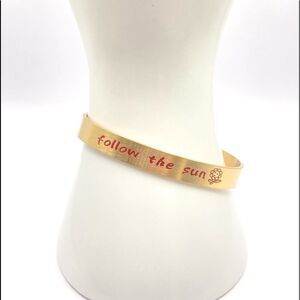 Minimalist gold follow the sun message cuff bracelet